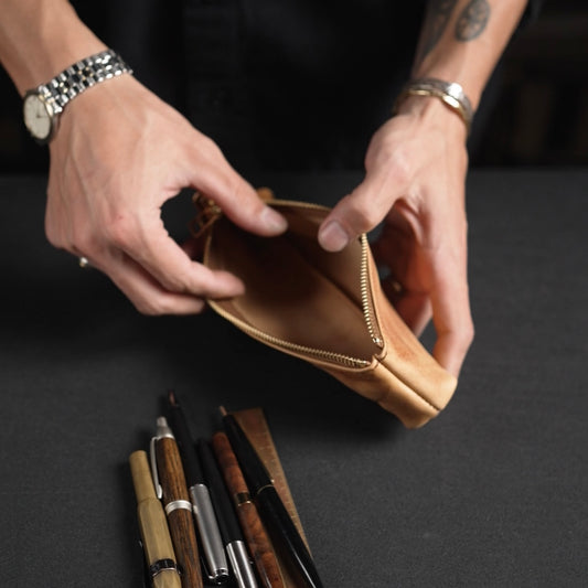 Triangular pen case