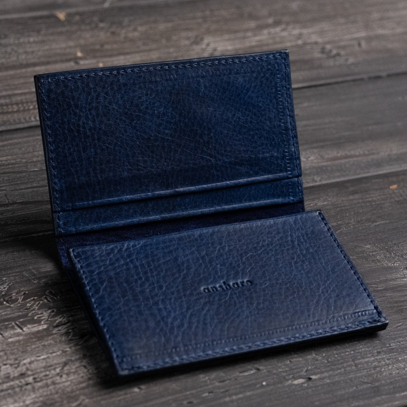 Business card holder with core